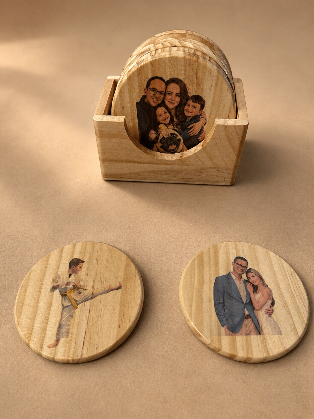 Personalized wooden photo coasters with a matching holder on a clean studio background