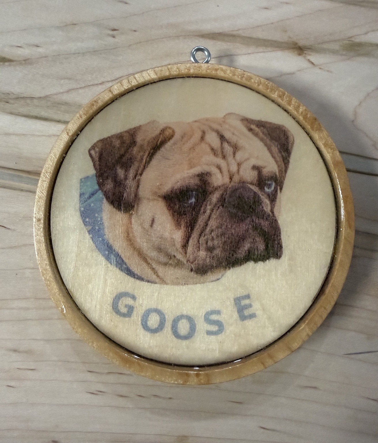 Personalized epoxy-finished wooden ornament featuring Goose the pug