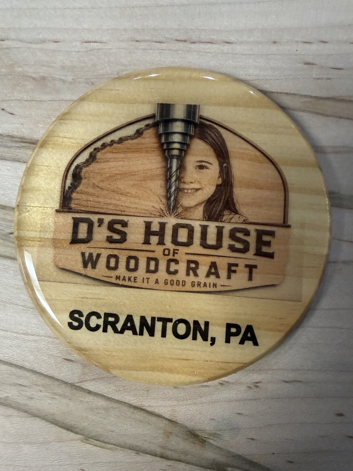 Epoxy-finished D's House of Woodcraft logo coaster